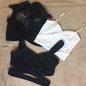 3 crop tops. Two black and one white. Size x-small